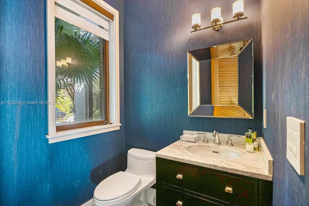 8601 Ponce De Leon Road, Miami, Florida, is ideal for family gatherings while providing ample indoor/outdoor spaces for a recreational and relaxing living experience.