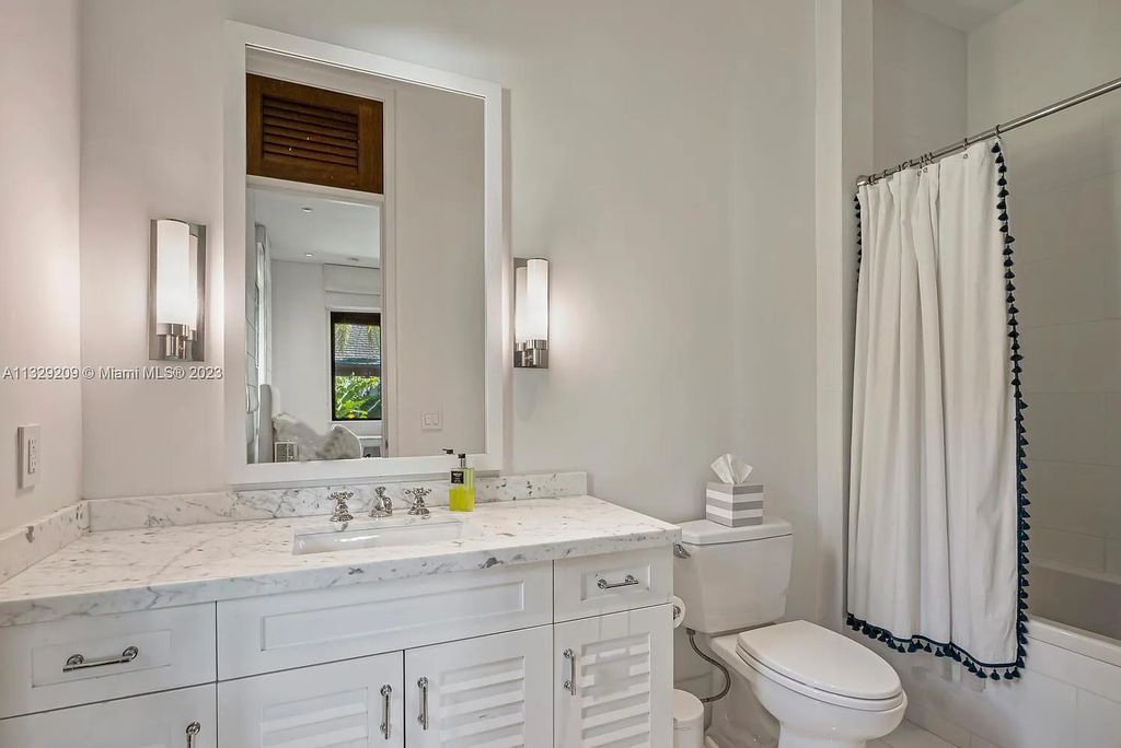 8601 Ponce De Leon Road, Miami, Florida, is ideal for family gatherings while providing ample indoor/outdoor spaces for a recreational and relaxing living experience.