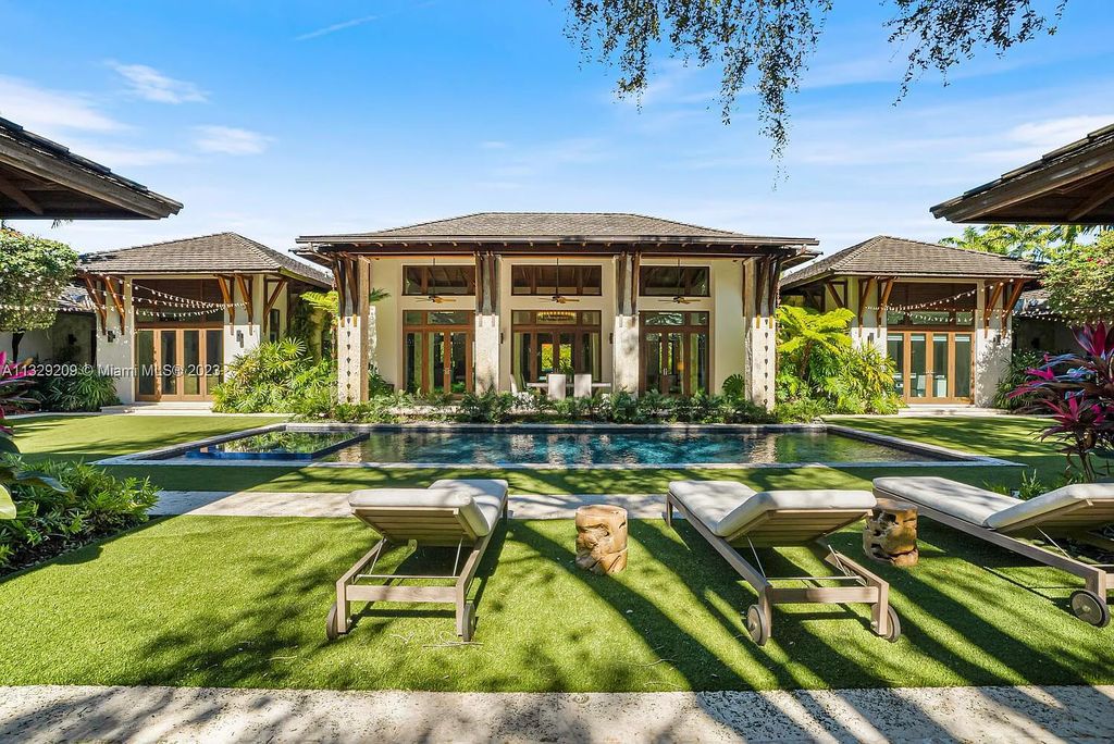 8601 Ponce De Leon Road, Miami, Florida, is ideal for family gatherings while providing ample indoor/outdoor spaces for a recreational and relaxing living experience.