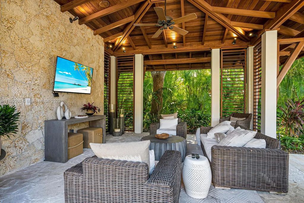 8601 Ponce De Leon Road, Miami, Florida, is ideal for family gatherings while providing ample indoor/outdoor spaces for a recreational and relaxing living experience.
