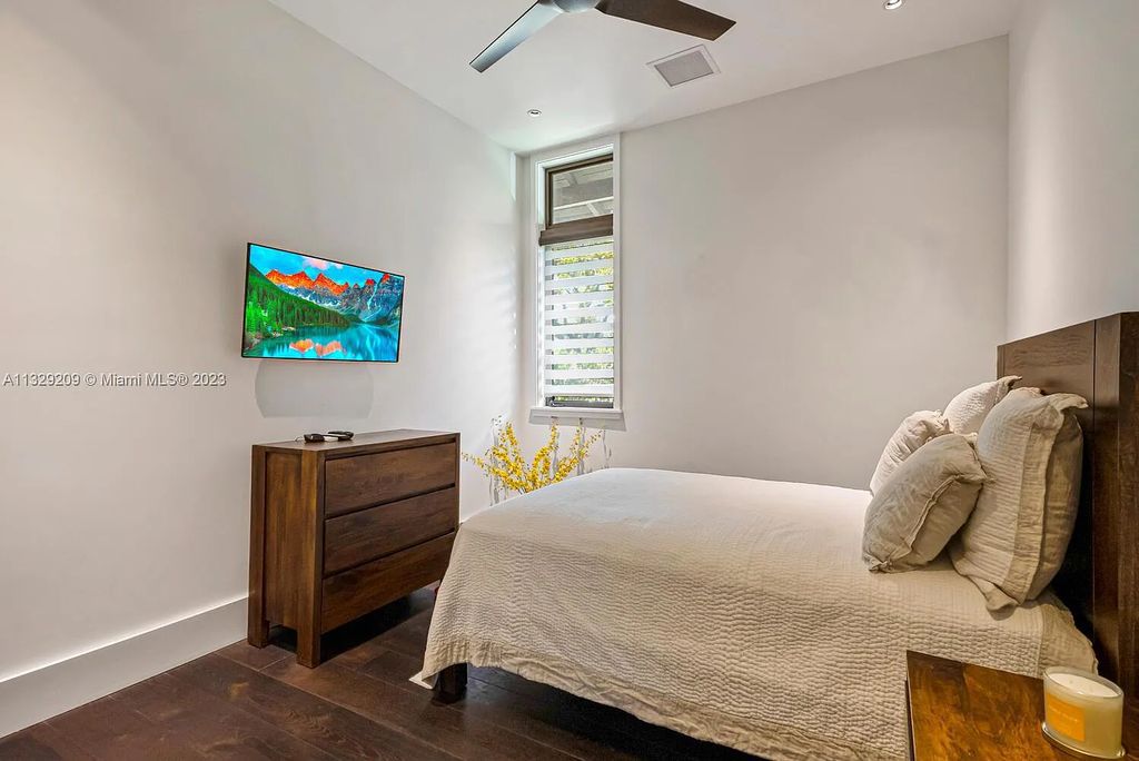8601 Ponce De Leon Road, Miami, Florida, is ideal for family gatherings while providing ample indoor/outdoor spaces for a recreational and relaxing living experience.