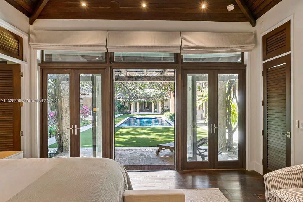 8601 Ponce De Leon Road, Miami, Florida, is ideal for family gatherings while providing ample indoor/outdoor spaces for a recreational and relaxing living experience.
