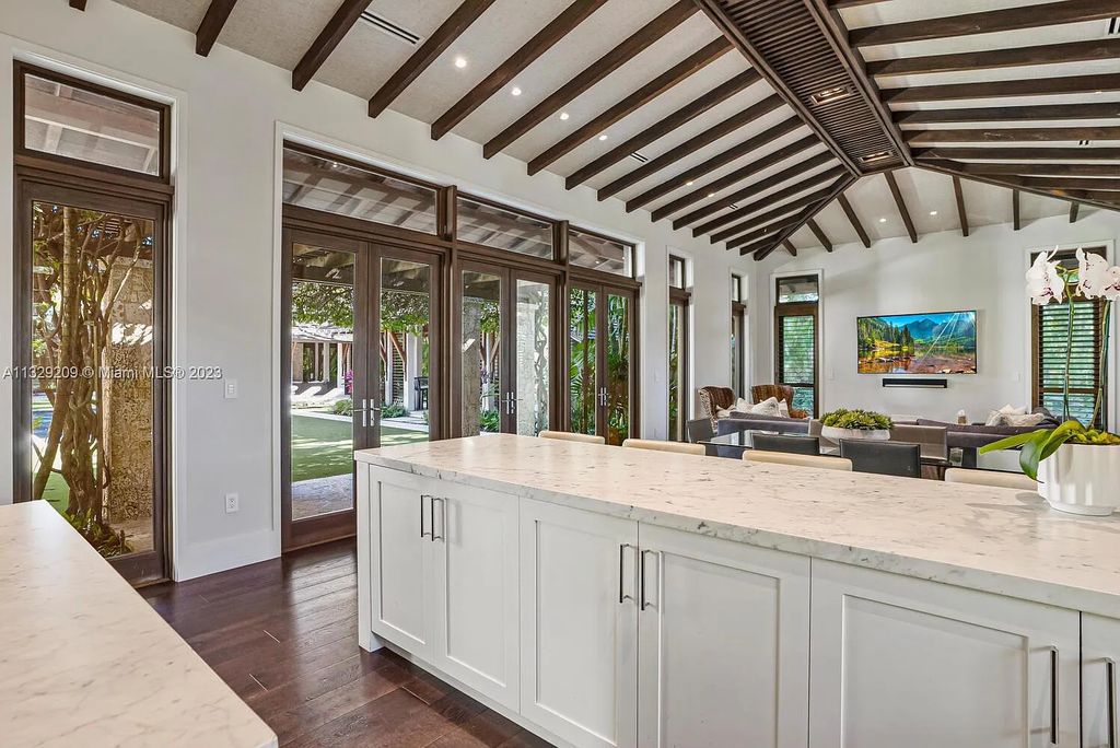 8601 Ponce De Leon Road, Miami, Florida, is ideal for family gatherings while providing ample indoor/outdoor spaces for a recreational and relaxing living experience.