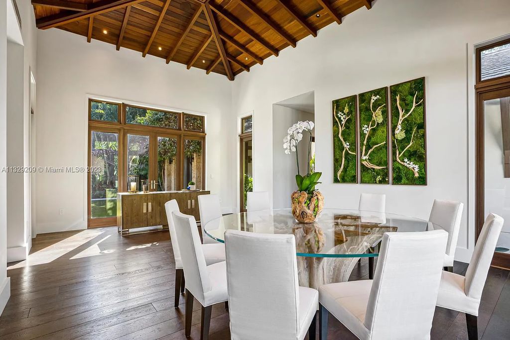 8601 Ponce De Leon Road, Miami, Florida, is ideal for family gatherings while providing ample indoor/outdoor spaces for a recreational and relaxing living experience.