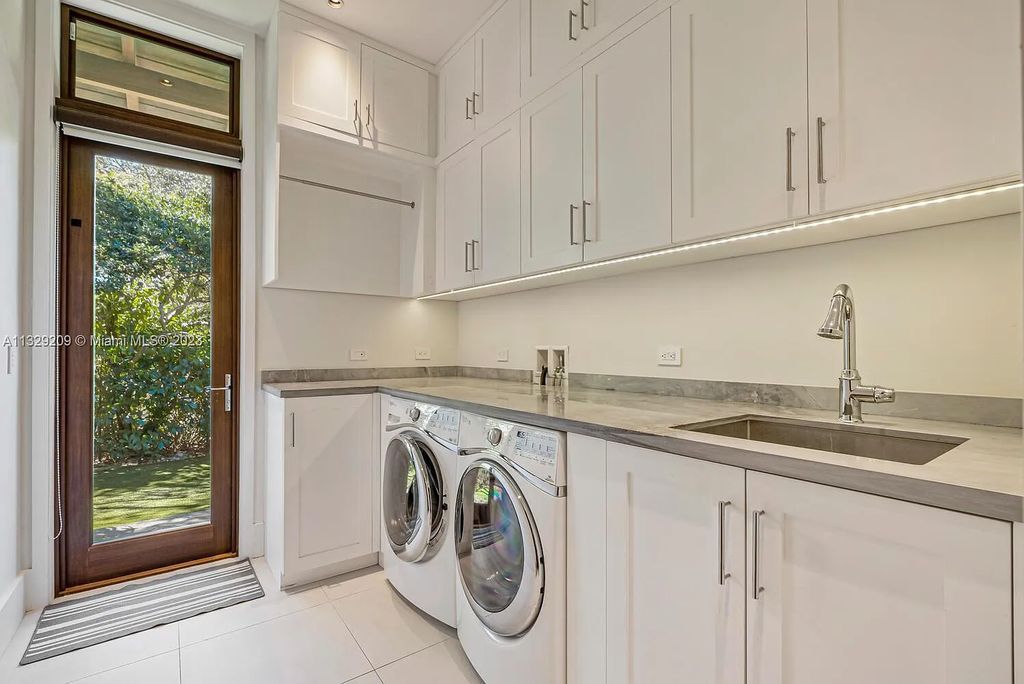 8601 Ponce De Leon Road, Miami, Florida, is ideal for family gatherings while providing ample indoor/outdoor spaces for a recreational and relaxing living experience.