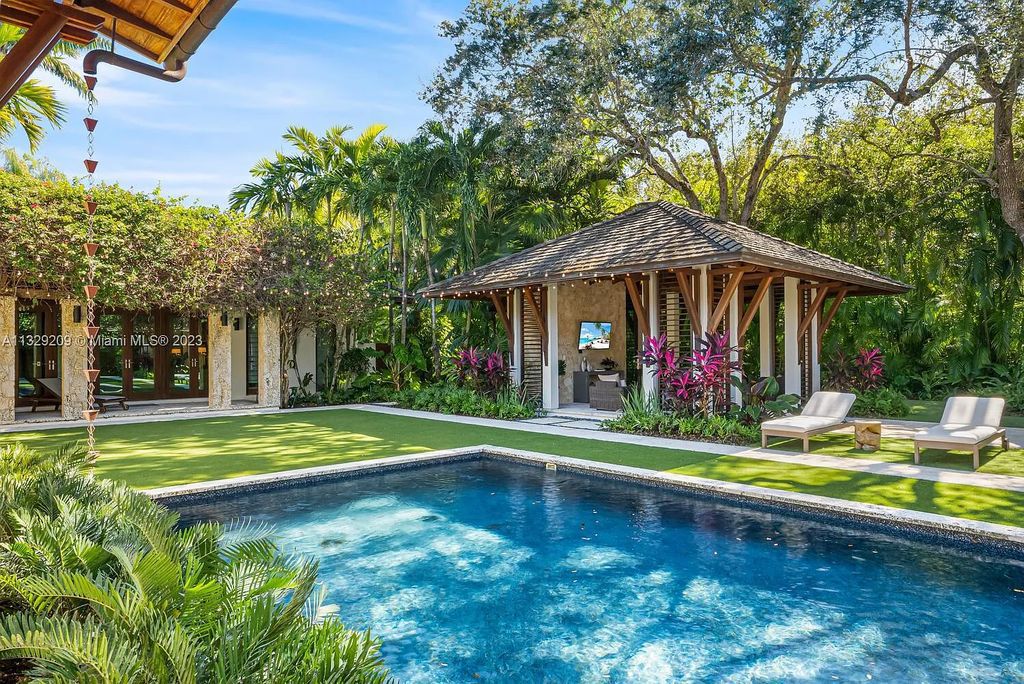 8601 Ponce De Leon Road, Miami, Florida, is ideal for family gatherings while providing ample indoor/outdoor spaces for a recreational and relaxing living experience.
