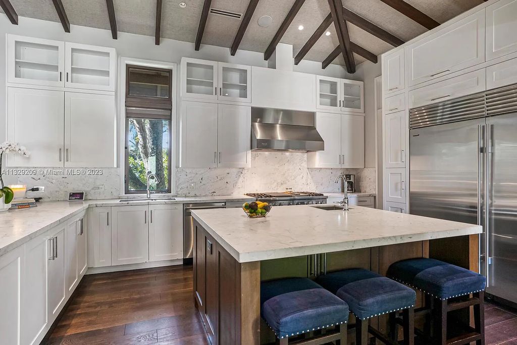 8601 Ponce De Leon Road, Miami, Florida, is ideal for family gatherings while providing ample indoor/outdoor spaces for a recreational and relaxing living experience.