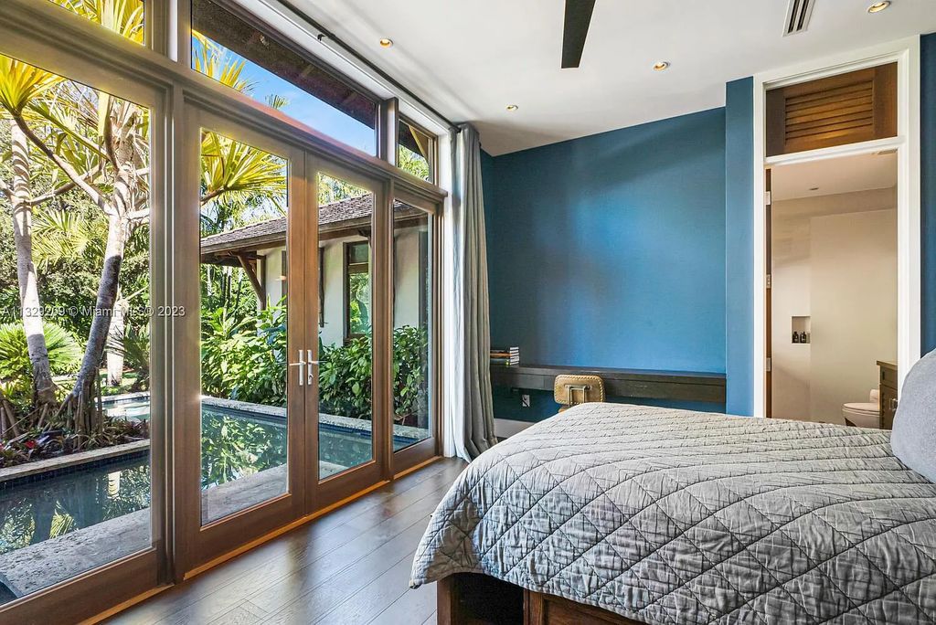 8601 Ponce De Leon Road, Miami, Florida, is ideal for family gatherings while providing ample indoor/outdoor spaces for a recreational and relaxing living experience.