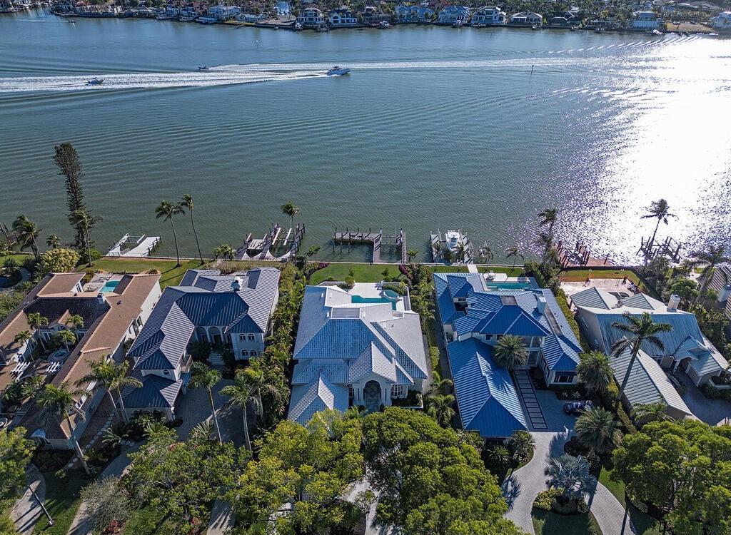 1947 8th Street South, Naples, Florida is spectacular residence on a unique location in the heart of Downtown capturing unparalleled views down Naples Bay towards Gordons Pass.