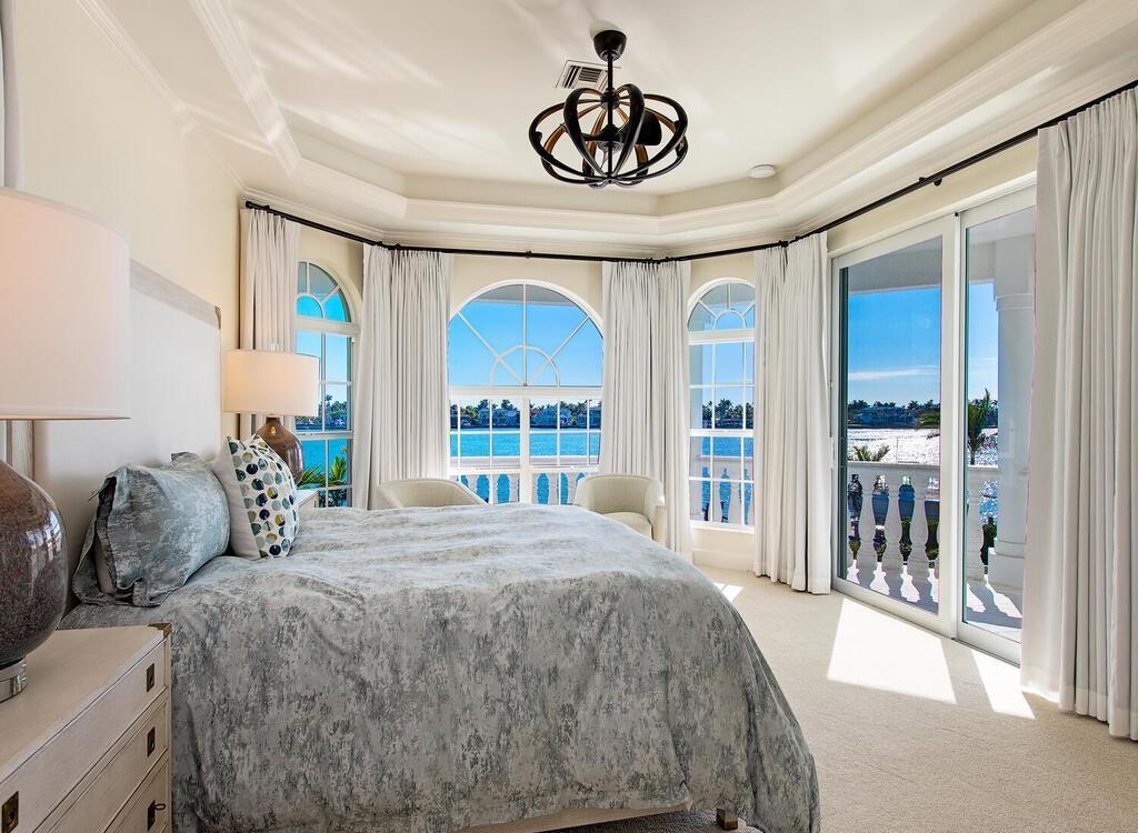 1947 8th Street South, Naples, Florida is spectacular residence on a unique location in the heart of Downtown capturing unparalleled views down Naples Bay towards Gordons Pass.
