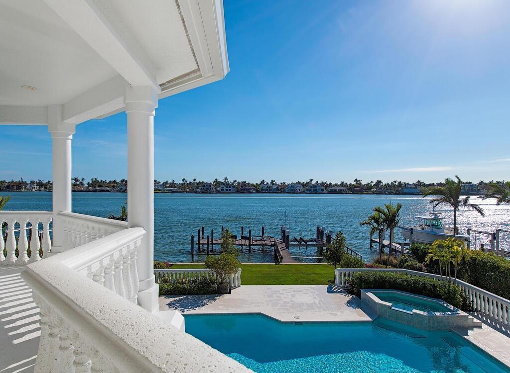 1947 8th Street South, Naples, Florida is spectacular residence on a unique location in the heart of Downtown capturing unparalleled views down Naples Bay towards Gordons Pass.