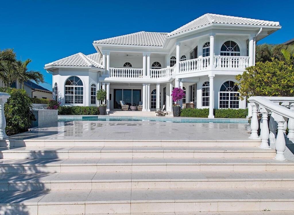1947 8th Street South, Naples, Florida is spectacular residence on a unique location in the heart of Downtown capturing unparalleled views down Naples Bay towards Gordons Pass.