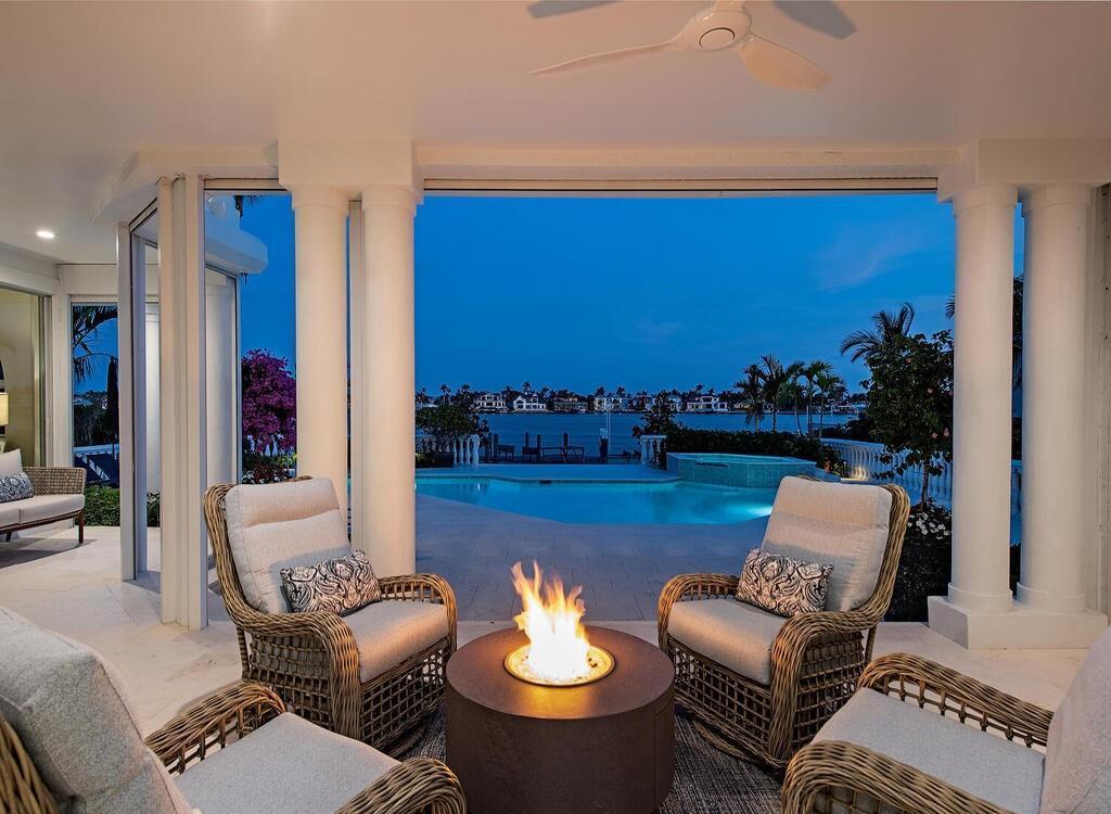 1947 8th Street South, Naples, Florida is spectacular residence on a unique location in the heart of Downtown capturing unparalleled views down Naples Bay towards Gordons Pass.