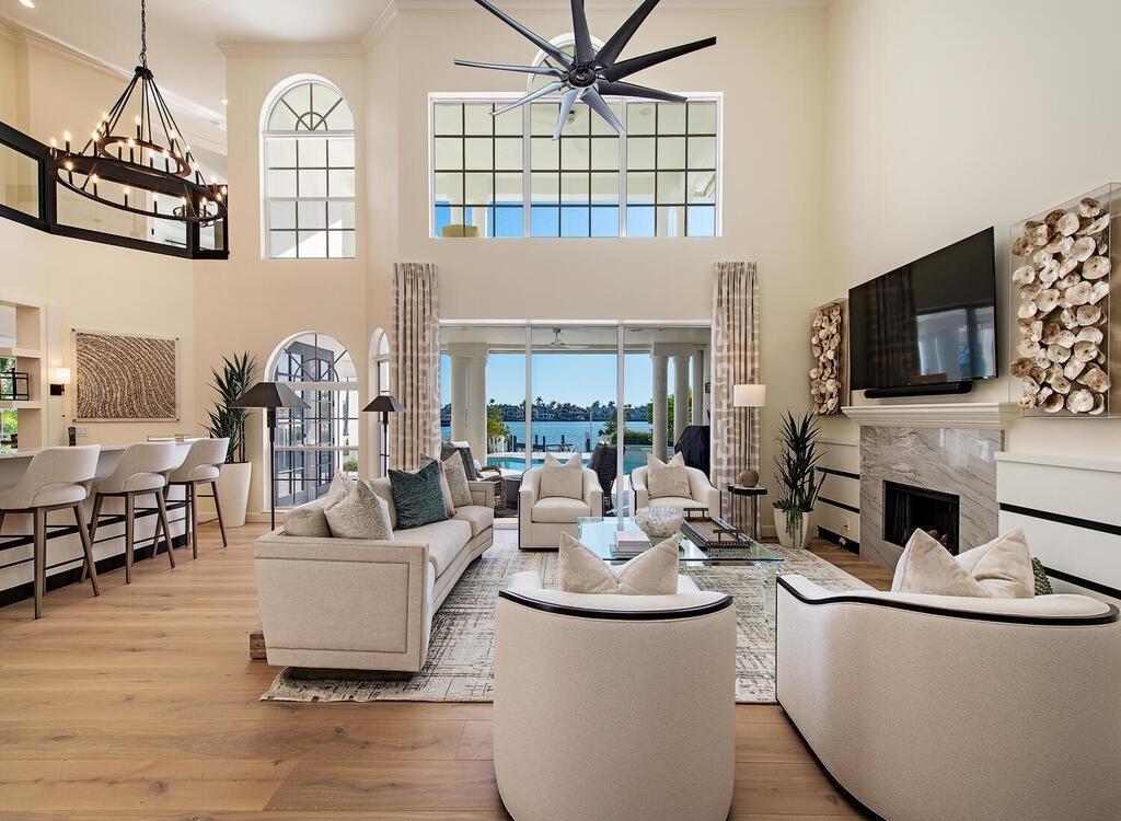 1947 8th Street South, Naples, Florida is spectacular residence on a unique location in the heart of Downtown capturing unparalleled views down Naples Bay towards Gordons Pass.