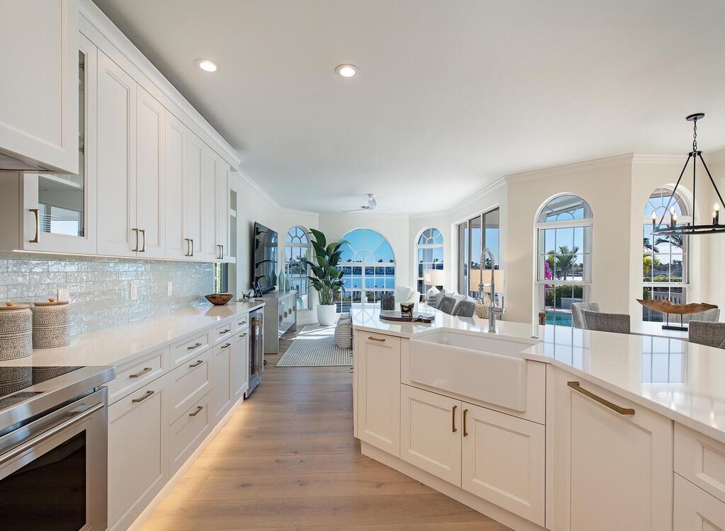 1947 8th Street South, Naples, Florida is spectacular residence on a unique location in the heart of Downtown capturing unparalleled views down Naples Bay towards Gordons Pass.