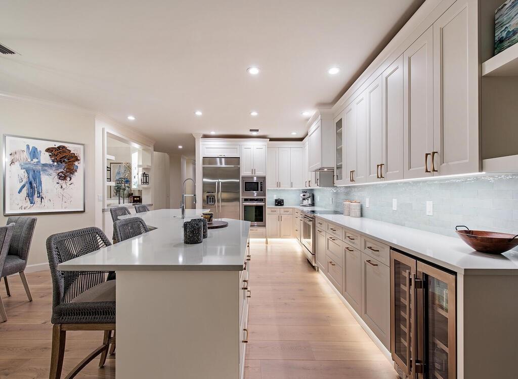 1947 8th Street South, Naples, Florida is spectacular residence on a unique location in the heart of Downtown capturing unparalleled views down Naples Bay towards Gordons Pass.