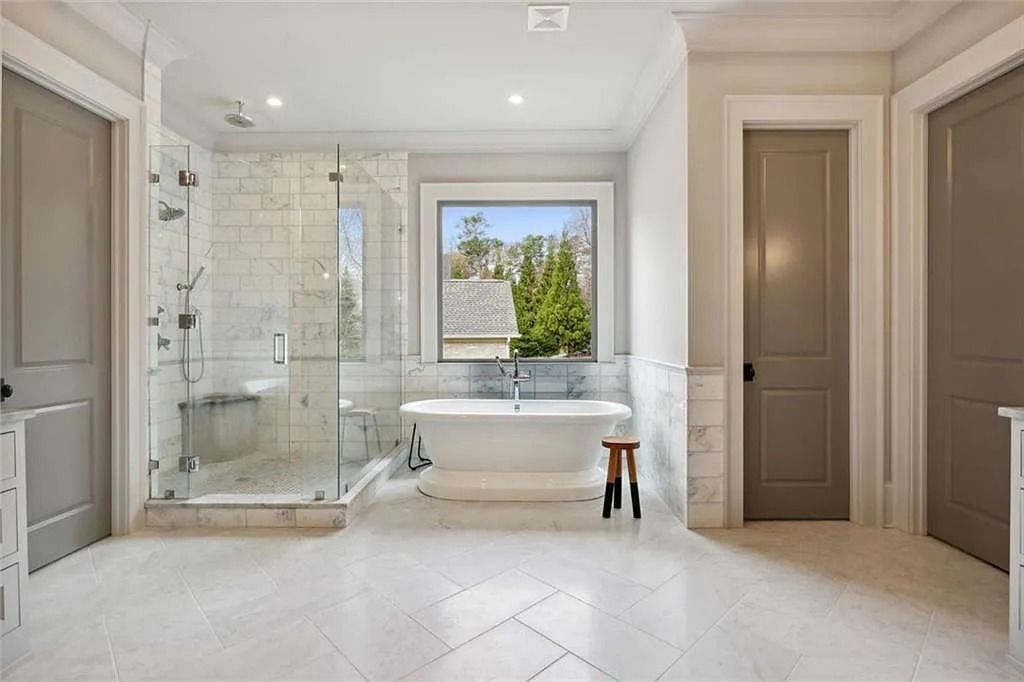 The Estate in Sandy Springs is a luxurious home showcasing magnificent garden area and perfect outdoor living area now available for sale. This home located at 4922 Powers Ferry Rd, Sandy Springs, Georgia; offering 05 bedrooms and 07 bathrooms with 6,515 square feet of living spaces. 