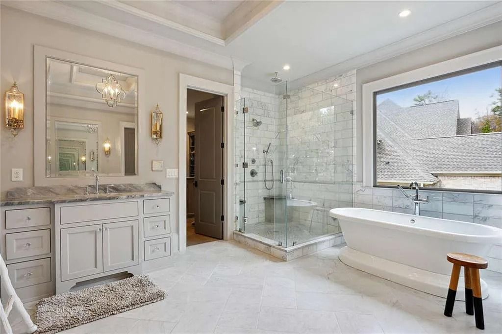 The Estate in Sandy Springs is a luxurious home showcasing magnificent garden area and perfect outdoor living area now available for sale. This home located at 4922 Powers Ferry Rd, Sandy Springs, Georgia; offering 05 bedrooms and 07 bathrooms with 6,515 square feet of living spaces. 