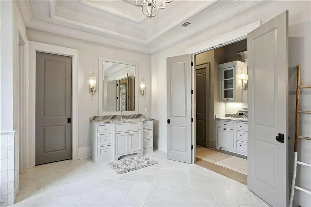 The Estate in Sandy Springs is a luxurious home showcasing magnificent garden area and perfect outdoor living area now available for sale. This home located at 4922 Powers Ferry Rd, Sandy Springs, Georgia; offering 05 bedrooms and 07 bathrooms with 6,515 square feet of living spaces. 