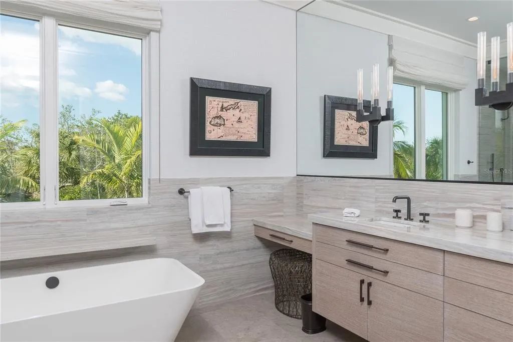 3799 Flamingo Avenue, Sarasota, Florida is an island paradise and strategically located to provide quick access to Sarasota’s shopping, dining, and world-renowned attractions, designed for entertaining and a relaxed island lifestyle. 