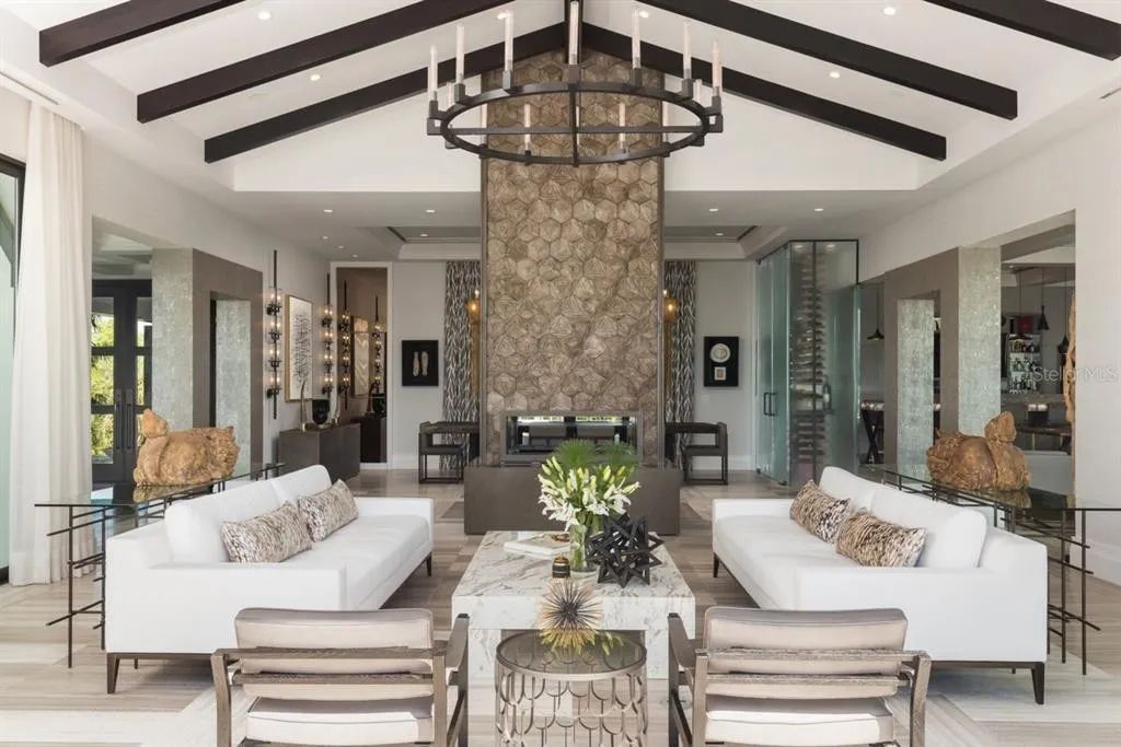 3799 Flamingo Avenue, Sarasota, Florida is an island paradise and strategically located to provide quick access to Sarasota’s shopping, dining, and world-renowned attractions, designed for entertaining and a relaxed island lifestyle. 