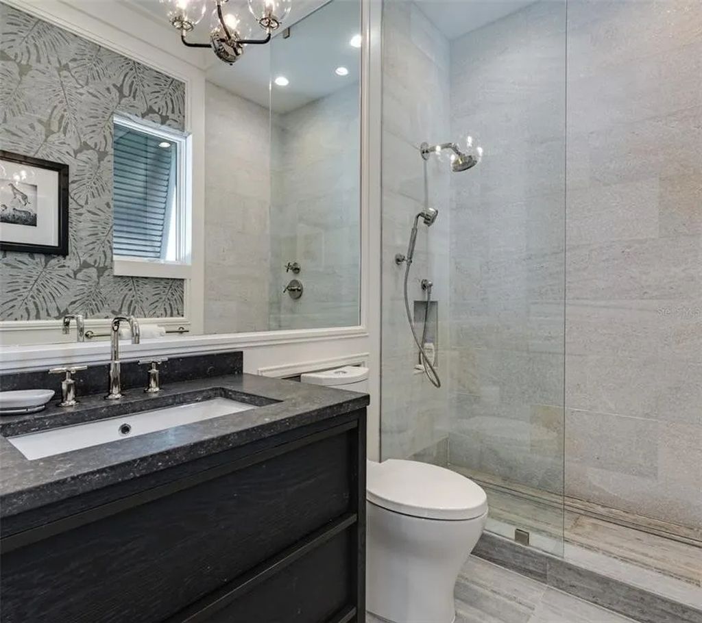 3799 Flamingo Avenue, Sarasota, Florida is an island paradise and strategically located to provide quick access to Sarasota’s shopping, dining, and world-renowned attractions, designed for entertaining and a relaxed island lifestyle. 