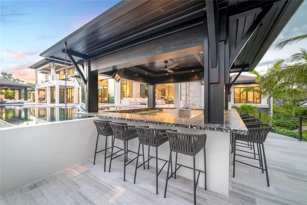 3799 Flamingo Avenue, Sarasota, Florida is an island paradise and strategically located to provide quick access to Sarasota’s shopping, dining, and world-renowned attractions, designed for entertaining and a relaxed island lifestyle. 