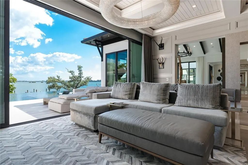 3799 Flamingo Avenue, Sarasota, Florida is an island paradise and strategically located to provide quick access to Sarasota’s shopping, dining, and world-renowned attractions, designed for entertaining and a relaxed island lifestyle. 