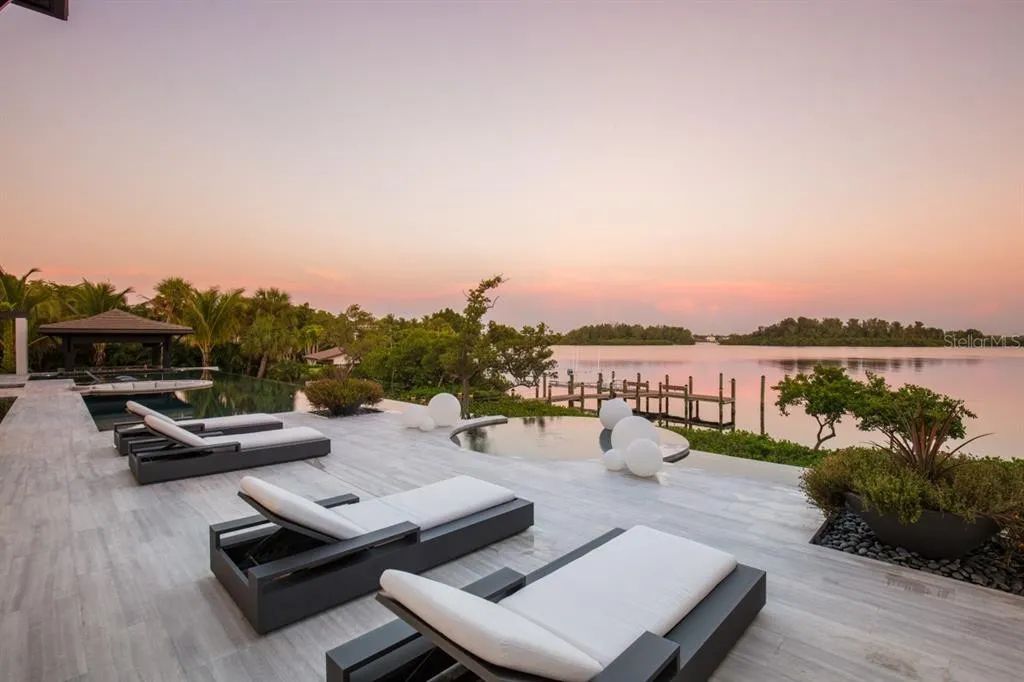 3799 Flamingo Avenue, Sarasota, Florida is an island paradise and strategically located to provide quick access to Sarasota’s shopping, dining, and world-renowned attractions, designed for entertaining and a relaxed island lifestyle. 