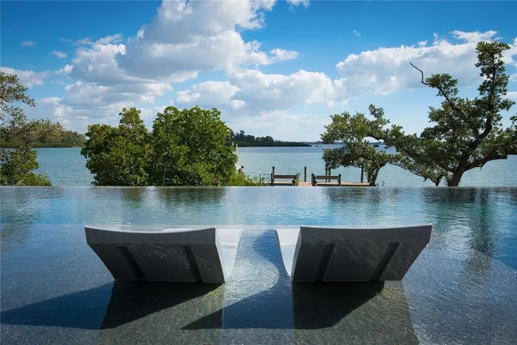 3799 Flamingo Avenue, Sarasota, Florida is an island paradise and strategically located to provide quick access to Sarasota’s shopping, dining, and world-renowned attractions, designed for entertaining and a relaxed island lifestyle. 