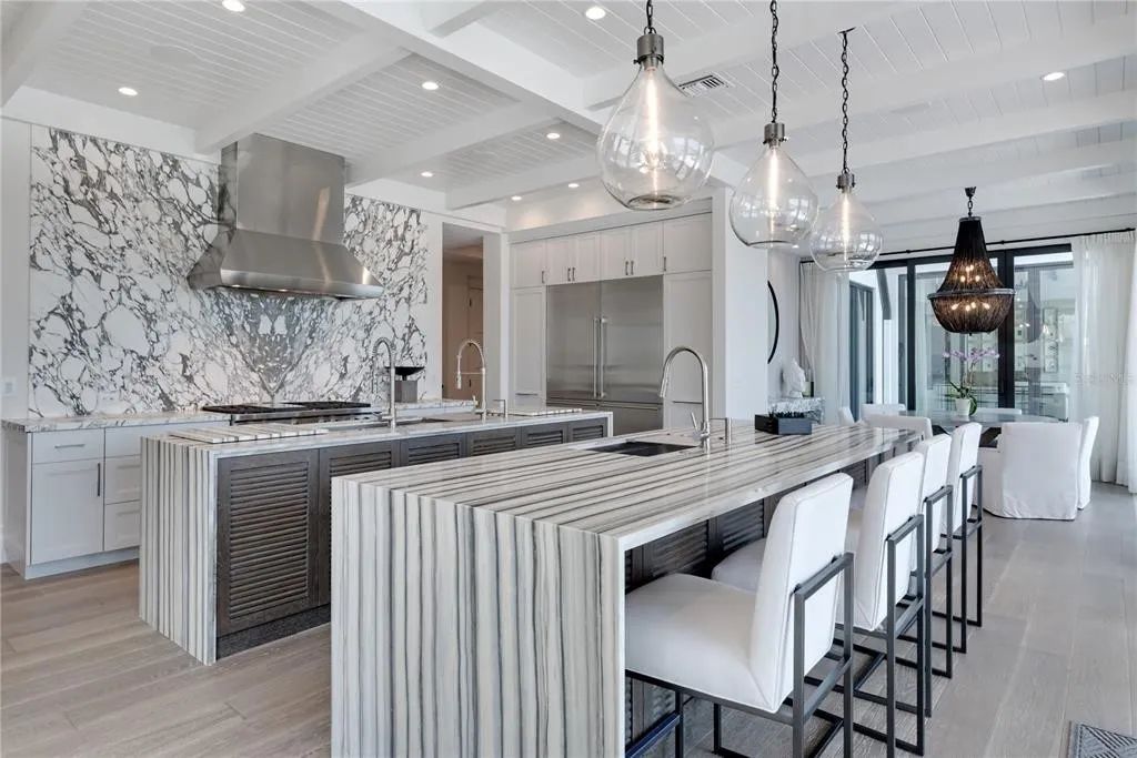 3799 Flamingo Avenue, Sarasota, Florida is an island paradise and strategically located to provide quick access to Sarasota’s shopping, dining, and world-renowned attractions, designed for entertaining and a relaxed island lifestyle. 