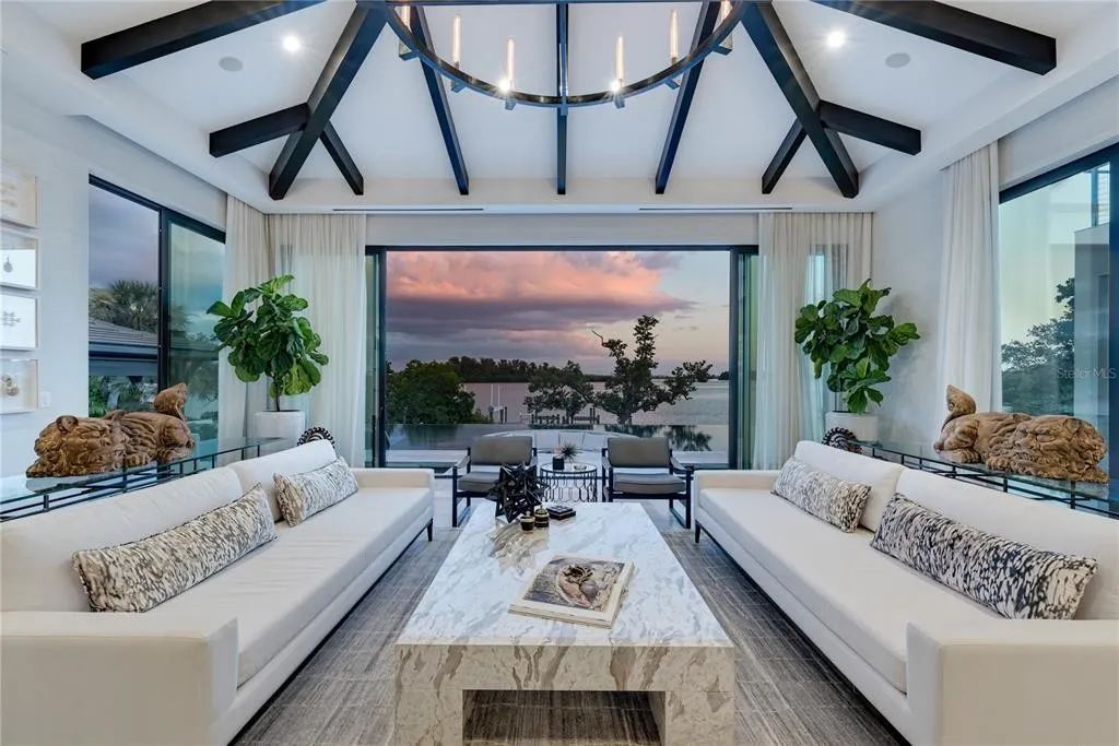3799 Flamingo Avenue, Sarasota, Florida is an island paradise and strategically located to provide quick access to Sarasota’s shopping, dining, and world-renowned attractions, designed for entertaining and a relaxed island lifestyle. 