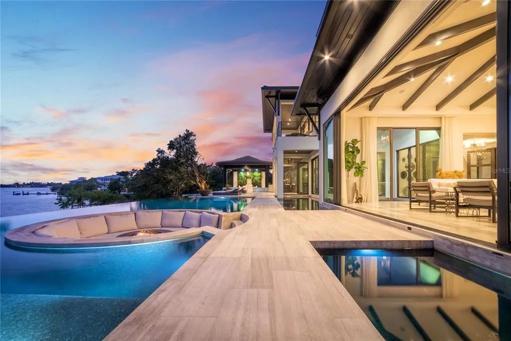 3799 Flamingo Avenue, Sarasota, Florida is an island paradise and strategically located to provide quick access to Sarasota’s shopping, dining, and world-renowned attractions, designed for entertaining and a relaxed island lifestyle. 