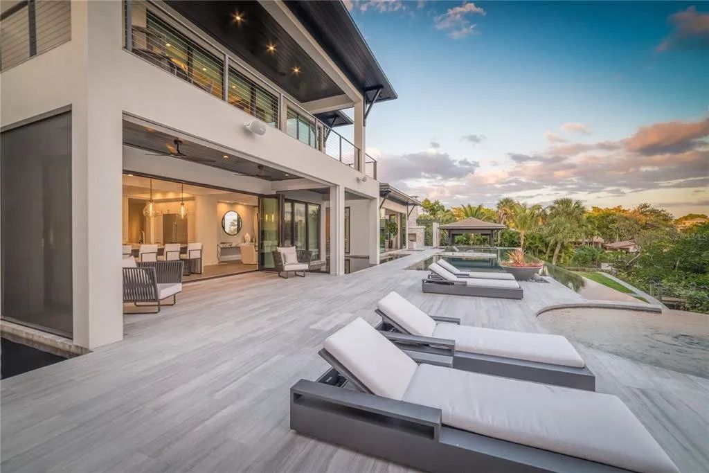 3799 Flamingo Avenue, Sarasota, Florida is an island paradise and strategically located to provide quick access to Sarasota’s shopping, dining, and world-renowned attractions, designed for entertaining and a relaxed island lifestyle. 