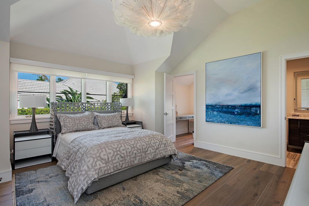 3595 Gin Lane, Naples, Florida is a gated property situated on nearly an acre overlooking Hidden Bay with quick access to the Gulf of Mexico, beautifully renovated and reimagined in 2018 with amenities as a private elevator, cherry wood library, double island in kitchen. 