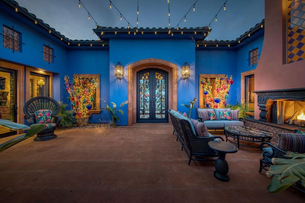 22137 Oak Glen Lane, Friant, California is a newly constructed home boasts 360 degree views of the snow-capped Sierras, Millerton Lake, Eagle Springs Golf Course and the City, enjoying the massive resort-style pool which includes a waterslide, private grotto and recessed fire pit.