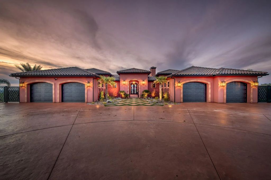 22137 Oak Glen Lane, Friant, California is a newly constructed home boasts 360 degree views of the snow-capped Sierras, Millerton Lake, Eagle Springs Golf Course and the City, enjoying the massive resort-style pool which includes a waterslide, private grotto and recessed fire pit.