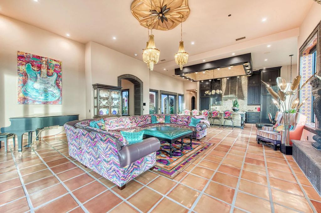 22137 Oak Glen Lane, Friant, California is a newly constructed home boasts 360 degree views of the snow-capped Sierras, Millerton Lake, Eagle Springs Golf Course and the City, enjoying the massive resort-style pool which includes a waterslide, private grotto and recessed fire pit.