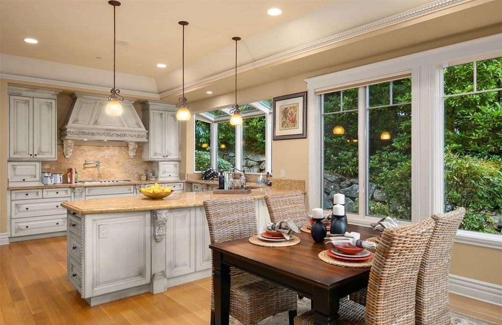 The Estate in Hunts Point was designed with rooms to be enjoyed by incorporating classic finishes and custom detailing throughout, now available for sale. This home located at 3210 Hunts Point Road, Hunts Point, Washington