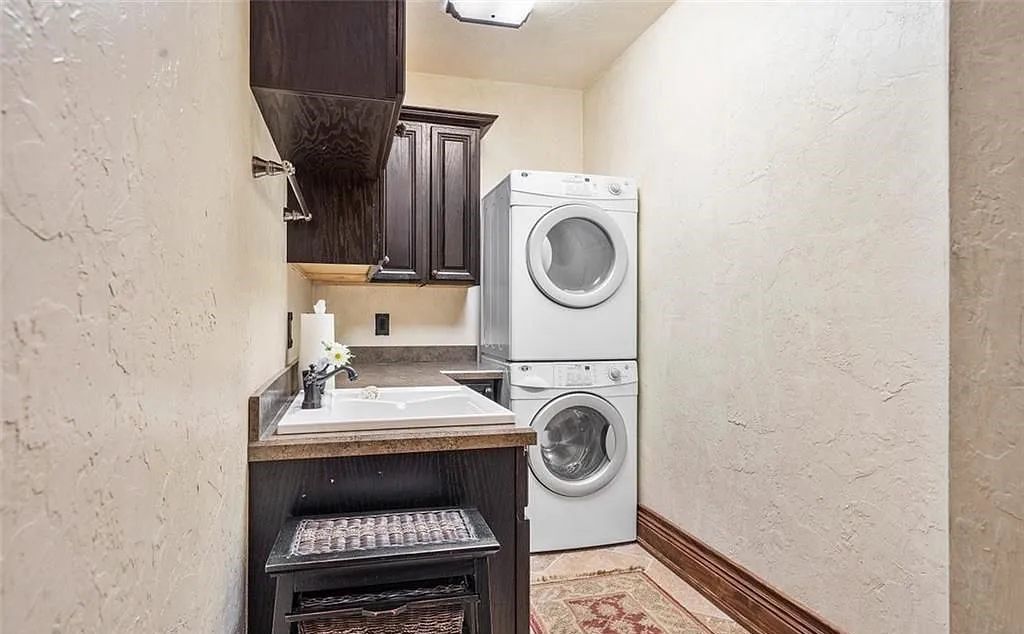 4560 S 25th Street, Fort Pierce, Florida, built on 20 acres in St Lucie County. The estate is being sold furnished and impact windows, gas powered appliance including the stove, dryers, pool heater, bbq grill, and both fireplaces.