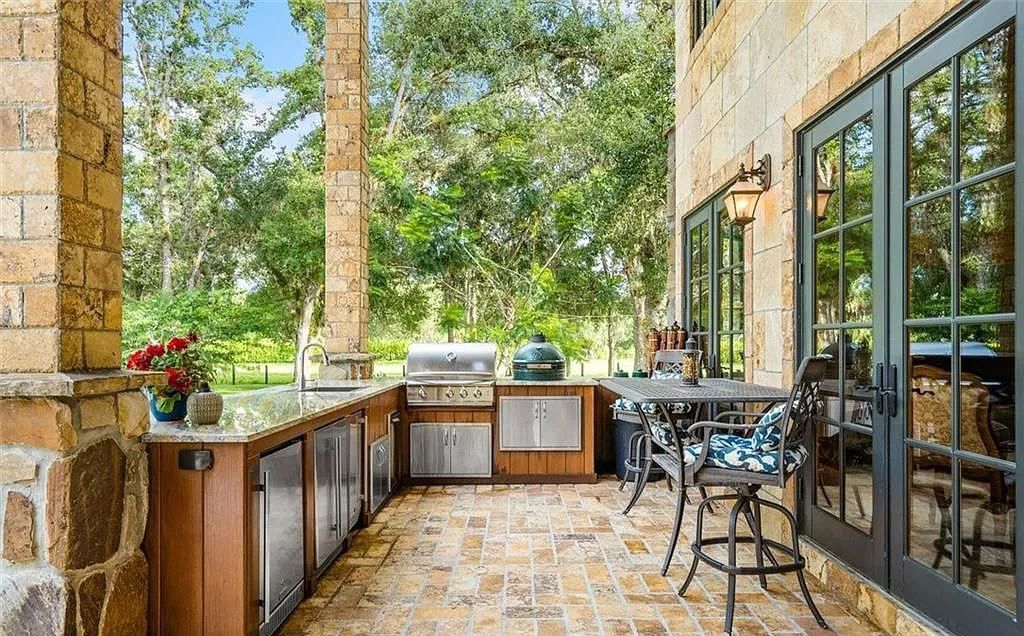 4560 S 25th Street, Fort Pierce, Florida, built on 20 acres in St Lucie County. The estate is being sold furnished and impact windows, gas powered appliance including the stove, dryers, pool heater, bbq grill, and both fireplaces.