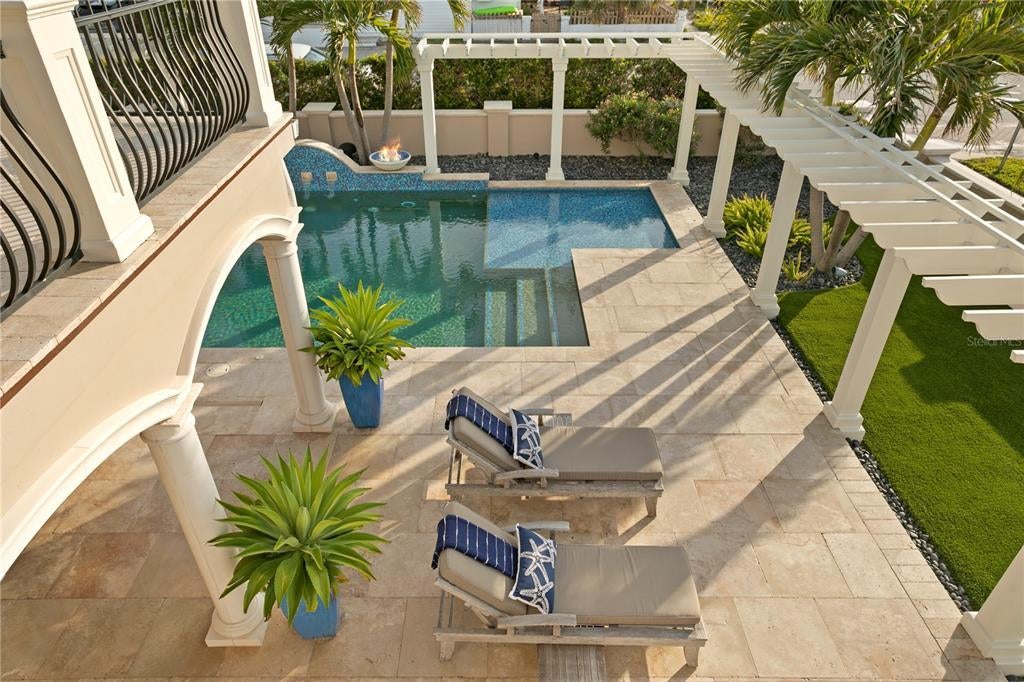 1103 Gulf Way, Saint Pete Beach, Florida is the ultimate beachfront retreat with the interior spaces are generous, the outdoor spaces are tremendous and the surrounding area creates a perfect place for Fun with Family and Friends.
