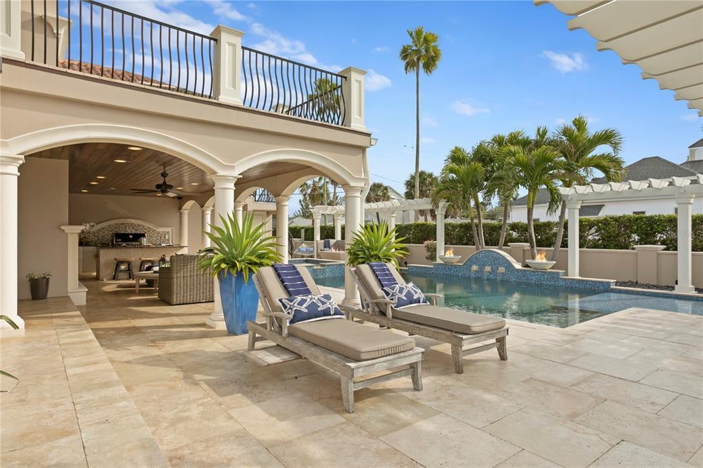 1103 Gulf Way, Saint Pete Beach, Florida is the ultimate beachfront retreat with the interior spaces are generous, the outdoor spaces are tremendous and the surrounding area creates a perfect place for Fun with Family and Friends.