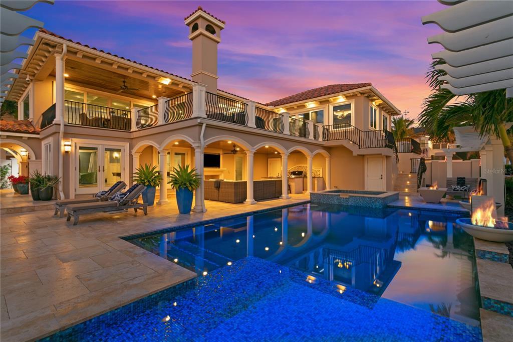 1103 Gulf Way, Saint Pete Beach, Florida is the ultimate beachfront retreat with the interior spaces are generous, the outdoor spaces are tremendous and the surrounding area creates a perfect place for Fun with Family and Friends.