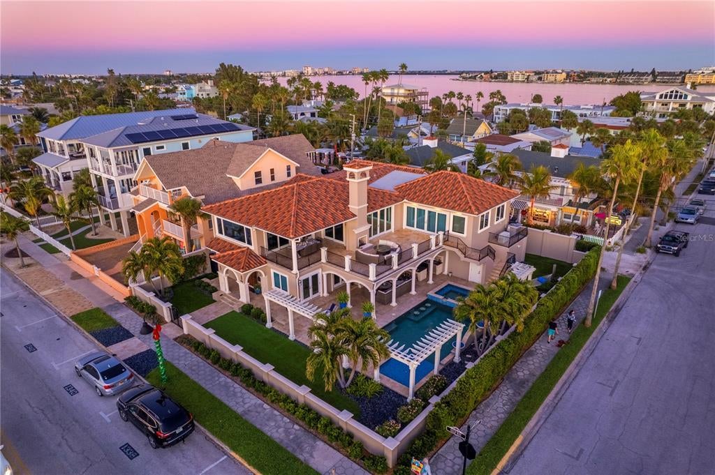 1103 Gulf Way, Saint Pete Beach, Florida is the ultimate beachfront retreat with the interior spaces are generous, the outdoor spaces are tremendous and the surrounding area creates a perfect place for Fun with Family and Friends.