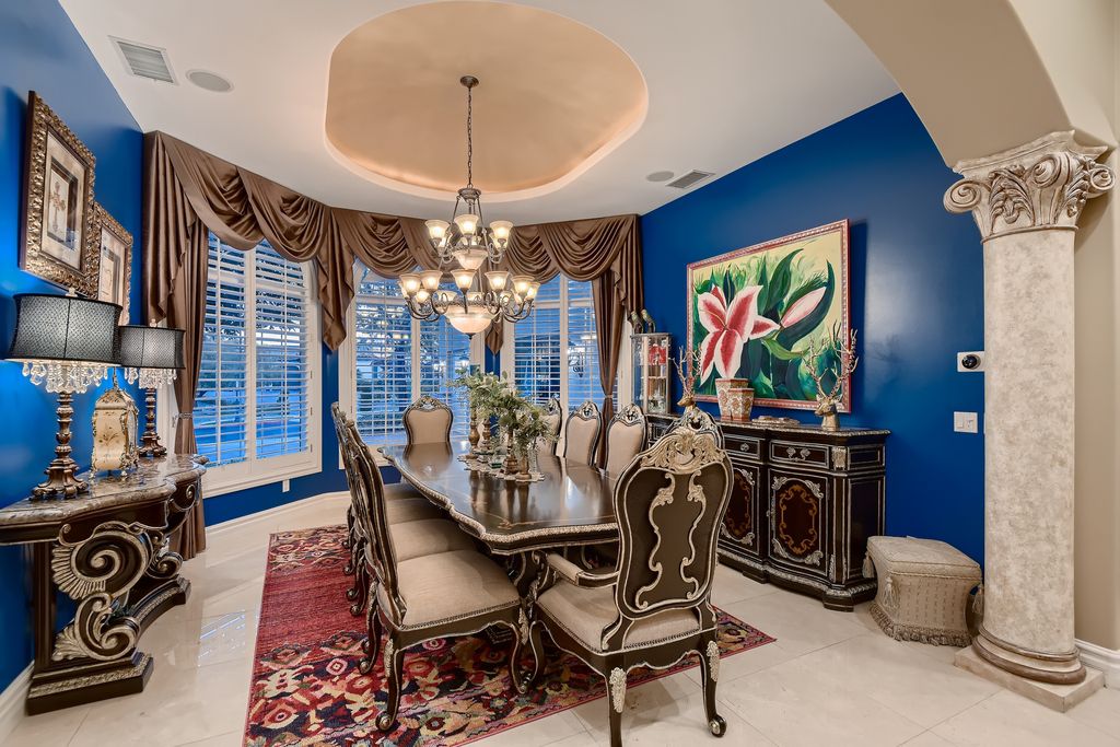 1278 Imperia Drive, Henderson, Nevada is a custom home in the exclusive guard gated community of Rapallo in Seven Hills, wrapped in lush green sculptured landscape in front and back.