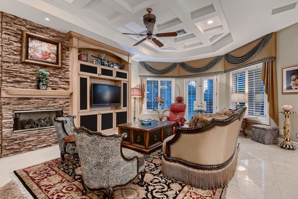 1278 Imperia Drive, Henderson, Nevada is a custom home in the exclusive guard gated community of Rapallo in Seven Hills, wrapped in lush green sculptured landscape in front and back.