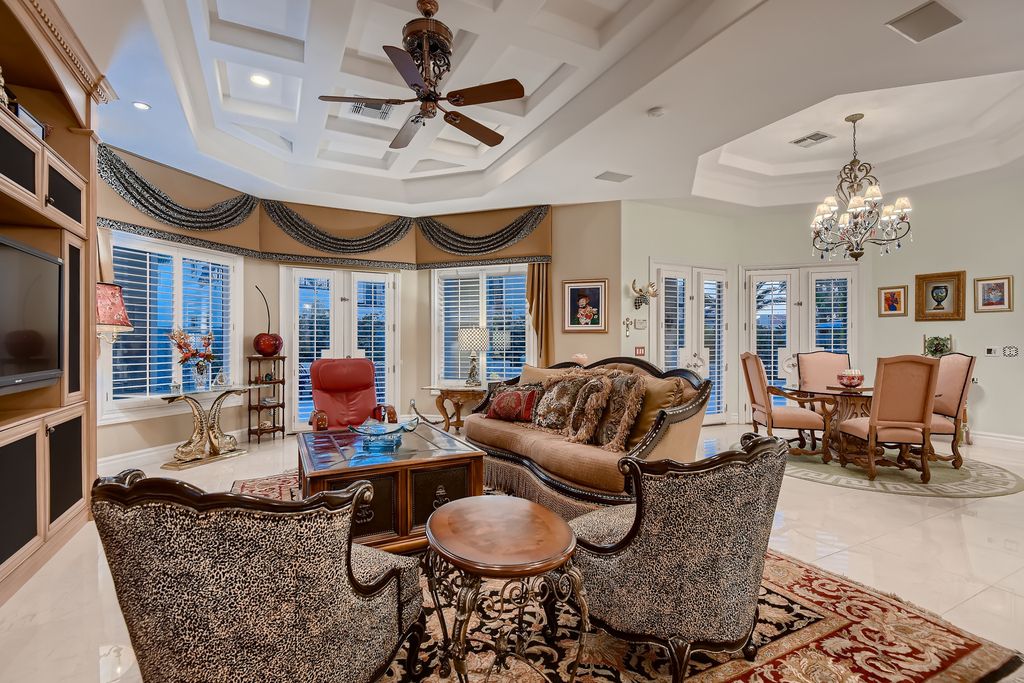 1278 Imperia Drive, Henderson, Nevada is a custom home in the exclusive guard gated community of Rapallo in Seven Hills, wrapped in lush green sculptured landscape in front and back.