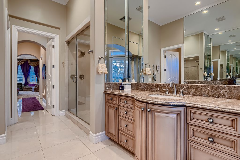 1278 Imperia Drive, Henderson, Nevada is a custom home in the exclusive guard gated community of Rapallo in Seven Hills, wrapped in lush green sculptured landscape in front and back.