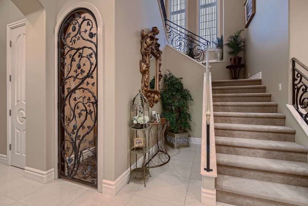 1278 Imperia Drive, Henderson, Nevada is a custom home in the exclusive guard gated community of Rapallo in Seven Hills, wrapped in lush green sculptured landscape in front and back.